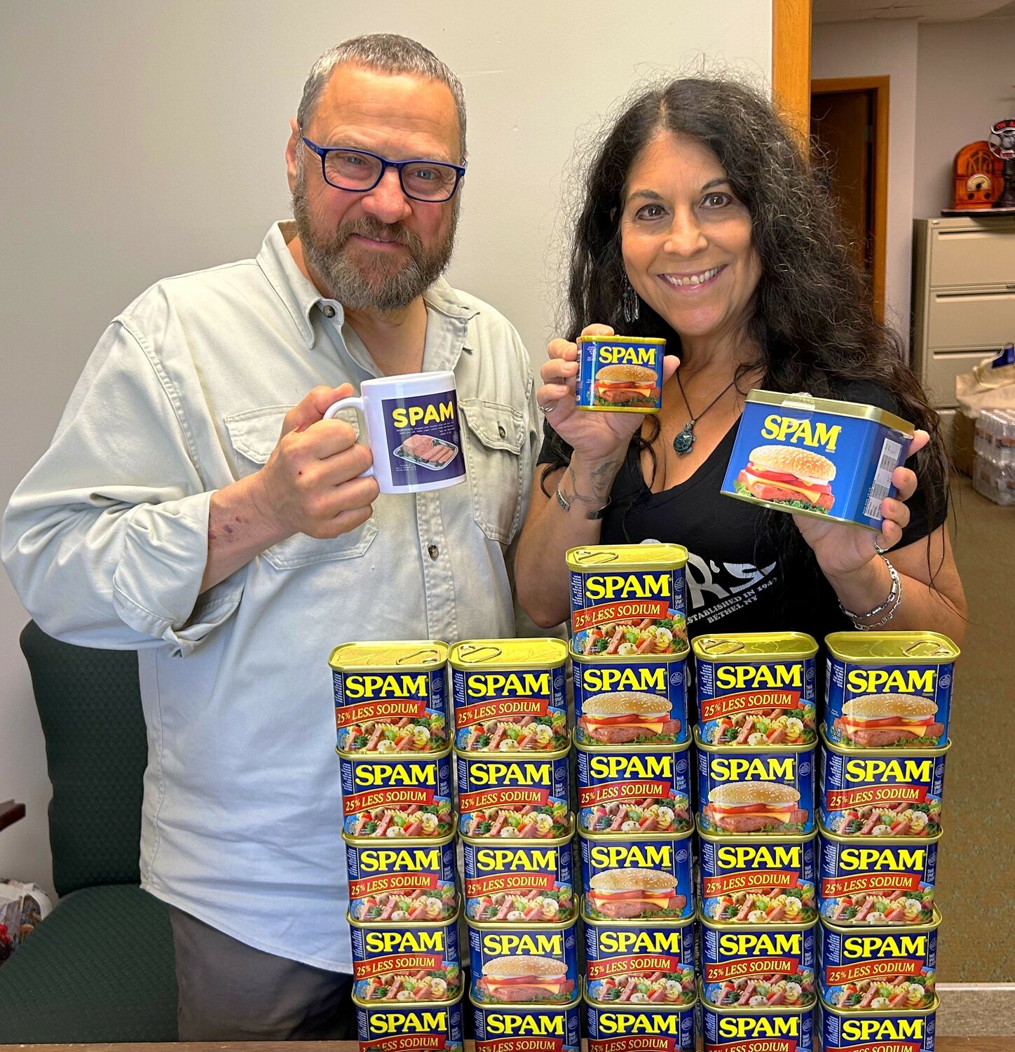 Try Kim's "Sweet and savory meat treat" recipe. Pictured are Paul Ciliberto, left; cans of SPAM; and Kim M. Simons.